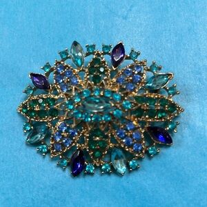 MCM Gold and Blue Rhinestone Brooch